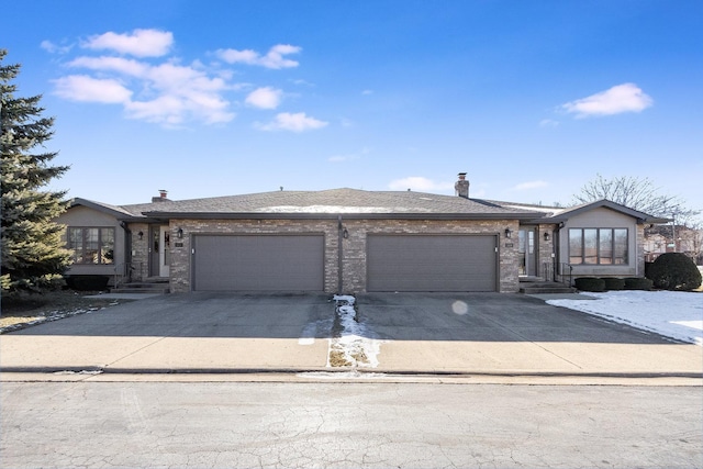 view of front of home with a garage