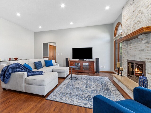 bedroom with ceiling fan, light colored carpet, multiple windows, and a textured ceiling