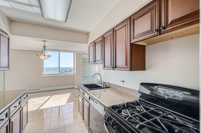 kitchen with light stone countertops, baseboard heating, gas range oven, a sink, and dishwasher