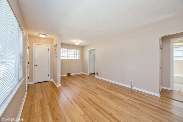 empty room with light wood-type flooring