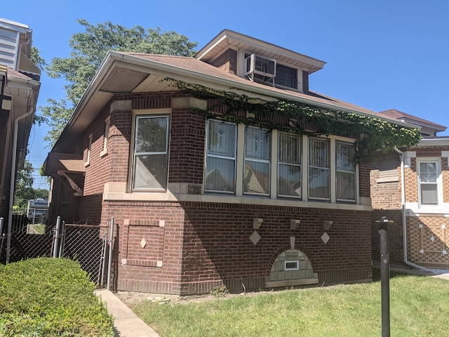 view of property exterior with a yard