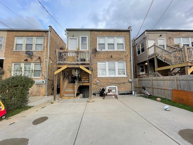 rear view of house with a deck