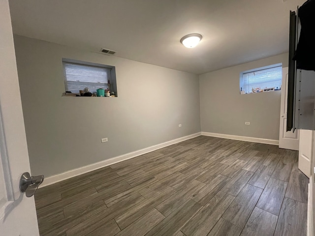 interior space with dark hardwood / wood-style flooring