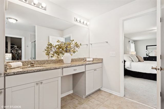 bathroom featuring vanity and tile patterned floors