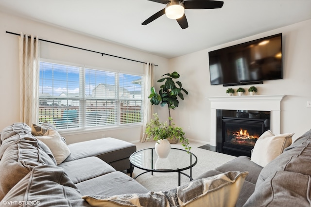 living room with carpet flooring and ceiling fan