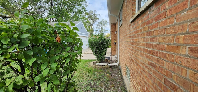 view of side of property featuring a garage