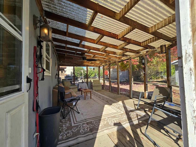 wooden deck featuring a pergola and ceiling fan