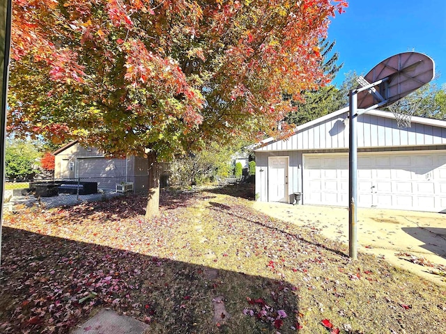 view of yard featuring a garage