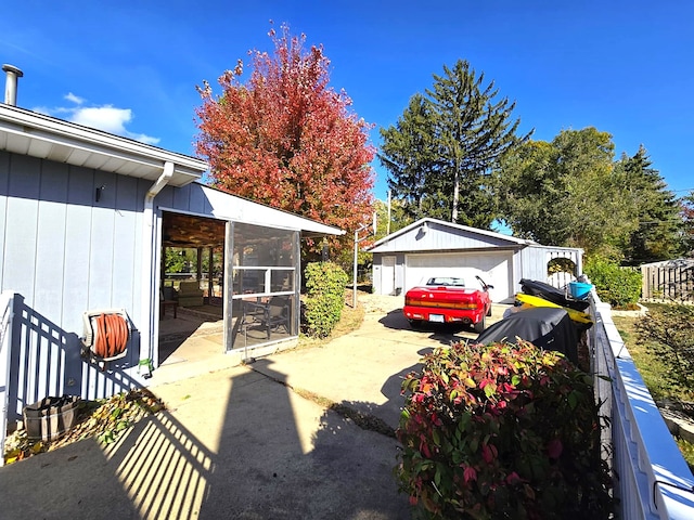 exterior space featuring an outdoor structure and a garage