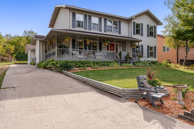 view of front of property with a porch and a front yard