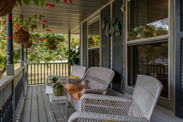 wooden deck with a porch