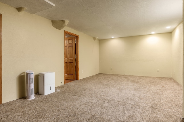 interior space with a textured ceiling