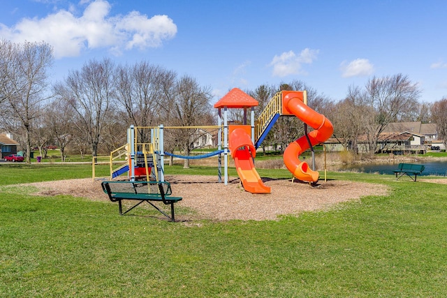 view of playground with a lawn