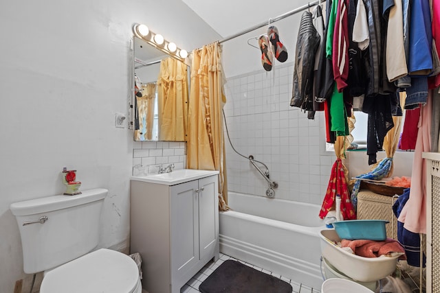 full bathroom with vanity, backsplash, shower / tub combo, tile patterned floors, and toilet