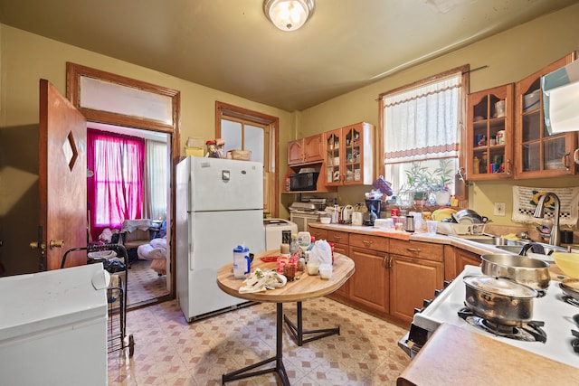 kitchen featuring white refrigerator