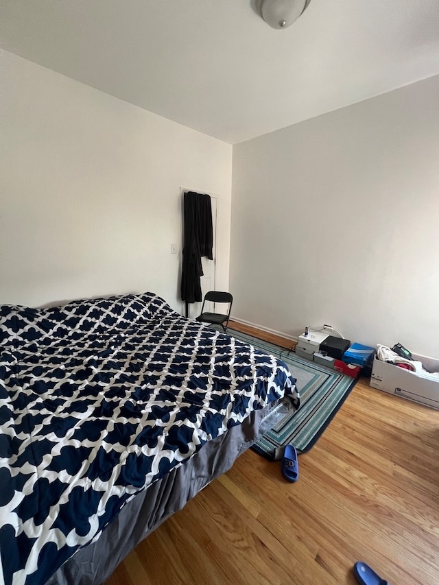 bedroom featuring hardwood / wood-style flooring