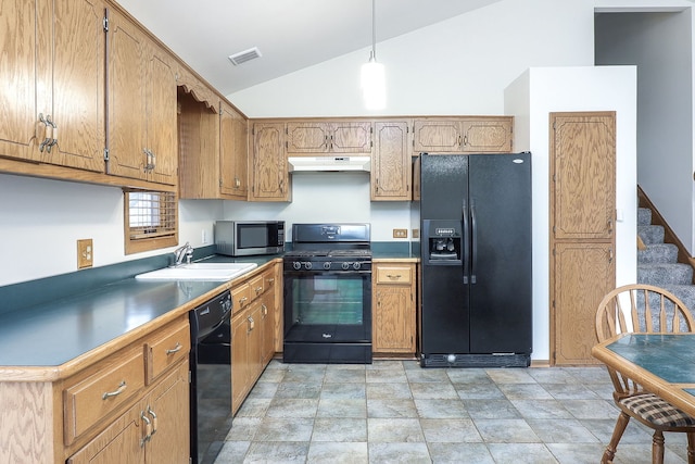 kitchen with hanging light fixtures, sink, black appliances, and vaulted ceiling