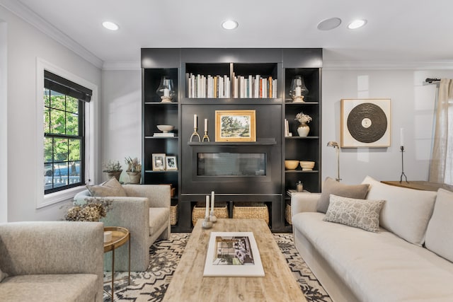 living room featuring crown molding