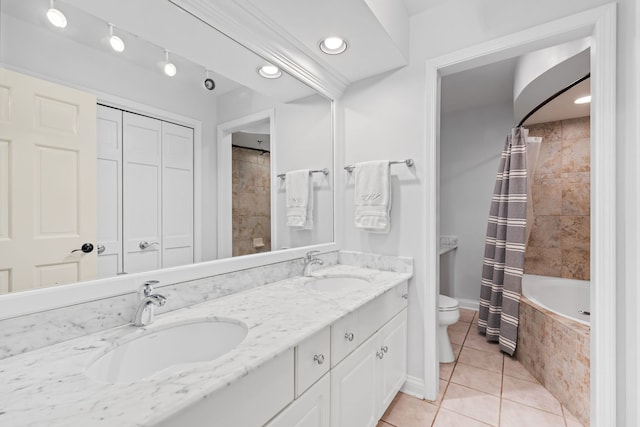 full bathroom with vanity, toilet, tile patterned floors, and shower / bath combo