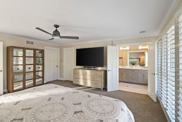 carpeted bedroom with connected bathroom, crown molding, and ceiling fan