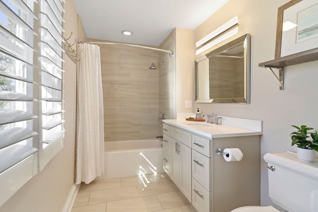 full bathroom featuring vanity, shower / bath combo, toilet, and tile patterned floors