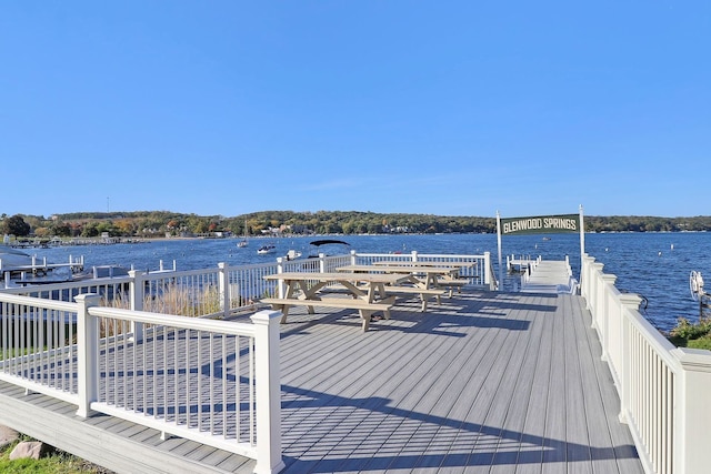 view of dock with a water view