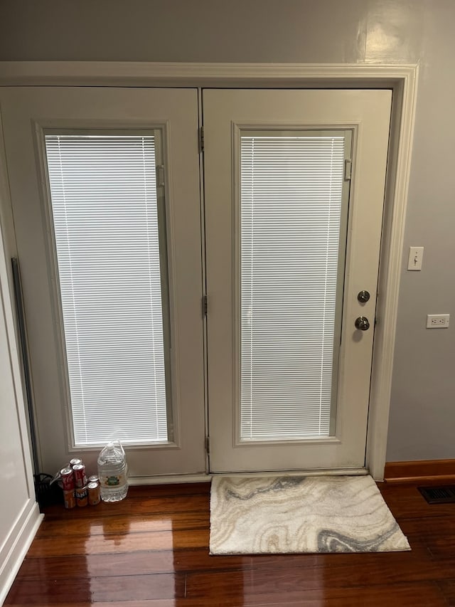 doorway featuring hardwood / wood-style floors