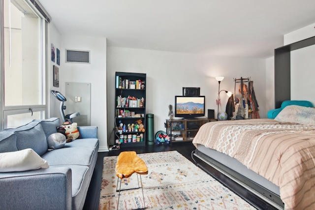 bedroom featuring hardwood / wood-style floors