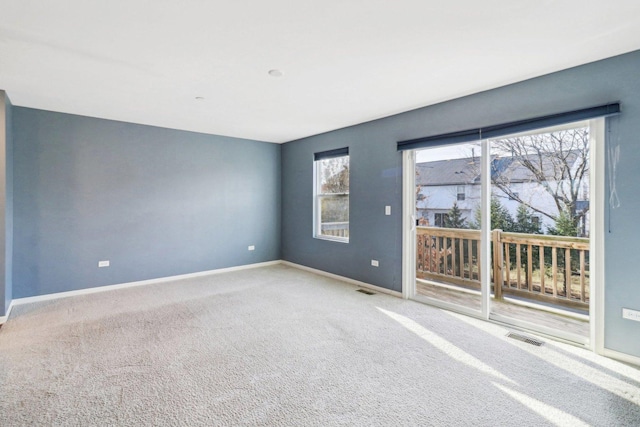 view of carpeted spare room