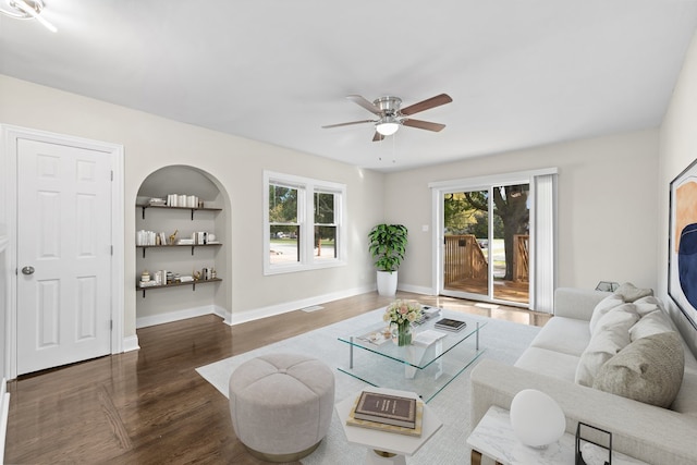 unfurnished room featuring dark hardwood / wood-style floors and ceiling fan