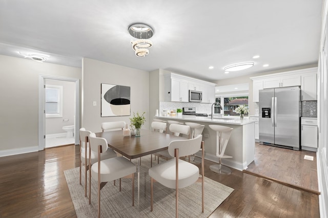 unfurnished living room featuring dark hardwood / wood-style floors