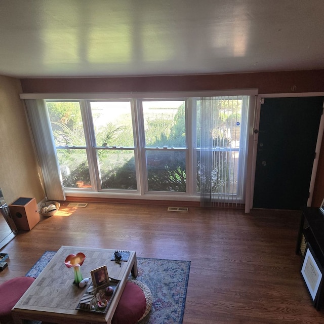 living room with dark hardwood / wood-style floors