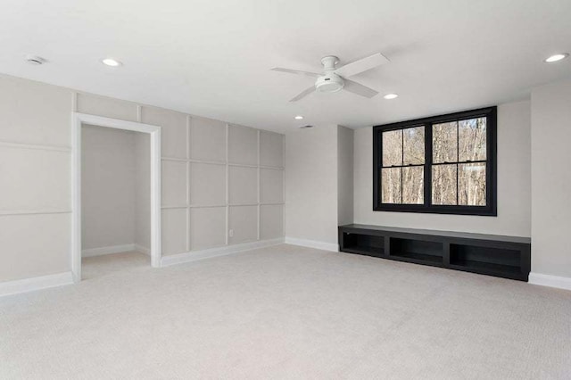 carpeted empty room with ceiling fan