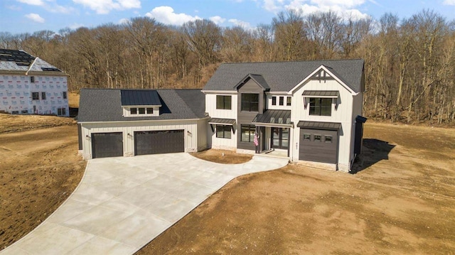 modern farmhouse with a garage