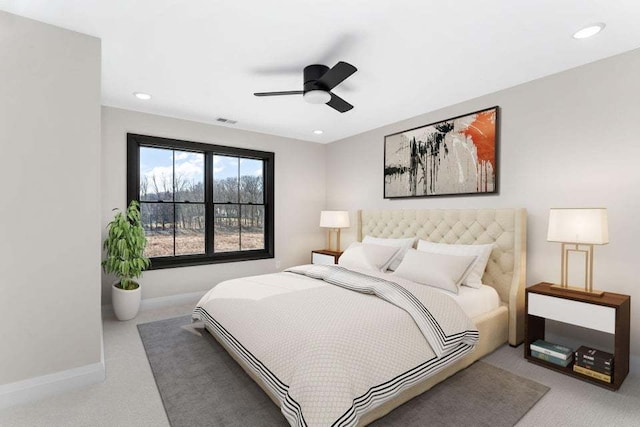 bedroom featuring ceiling fan and carpet flooring