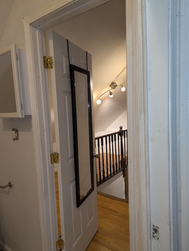 corridor featuring light hardwood / wood-style floors