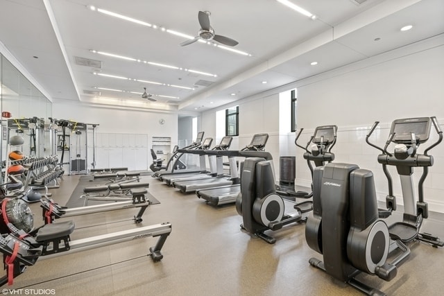 exercise room featuring ceiling fan