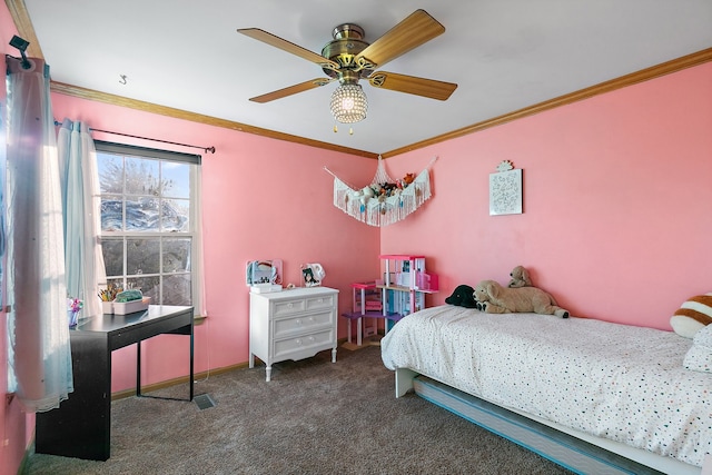 bedroom with dark colored carpet, crown molding, and ceiling fan