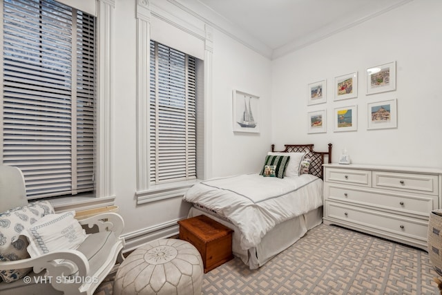 bedroom featuring crown molding