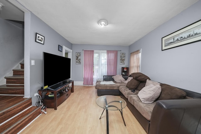 living room with light hardwood / wood-style floors