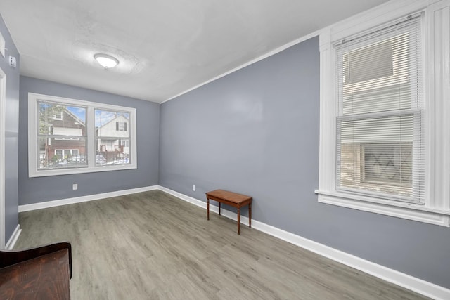 unfurnished room featuring hardwood / wood-style flooring