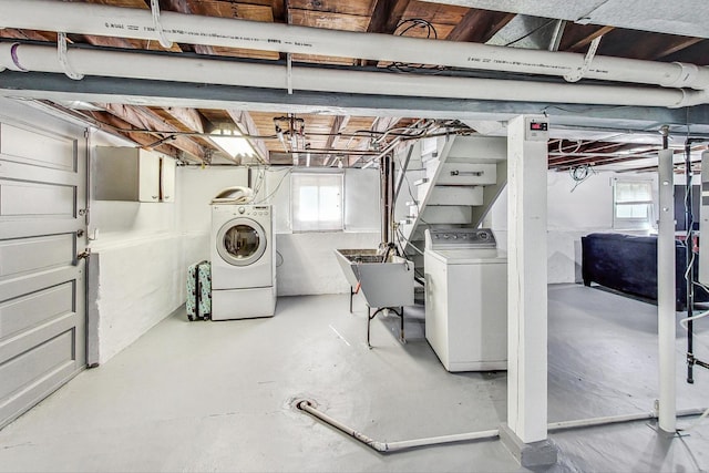 basement with separate washer and dryer