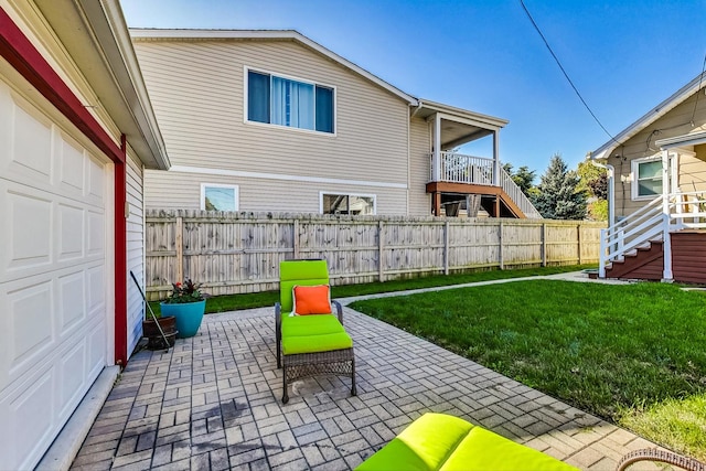 view of patio featuring a garage