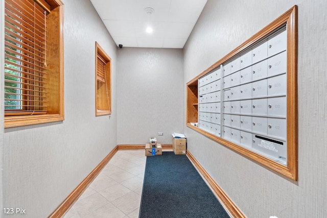 hallway featuring mail boxes