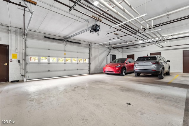 garage featuring a garage door opener