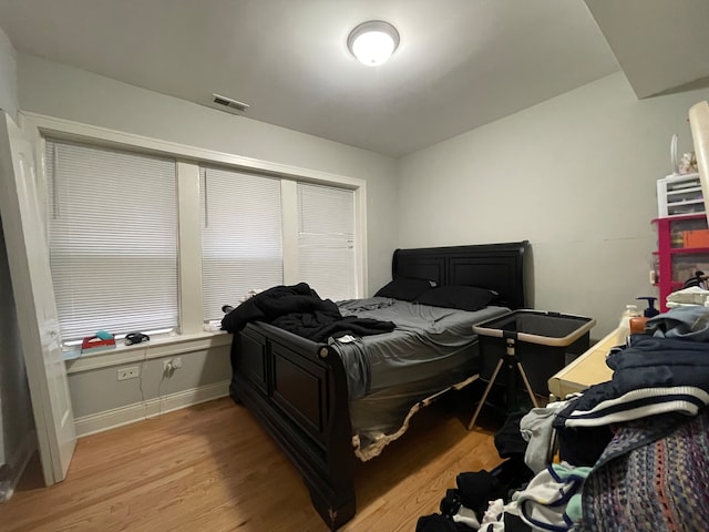 bedroom featuring light hardwood / wood-style floors