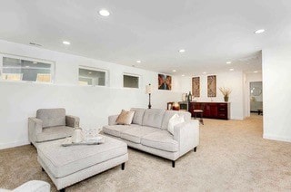 living room with light carpet