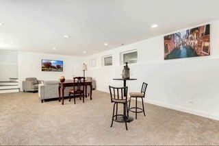 view of carpeted dining space