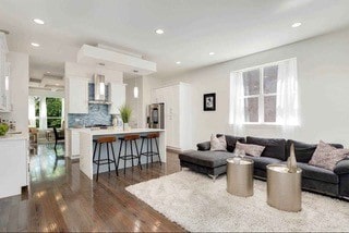 living room featuring dark wood-type flooring