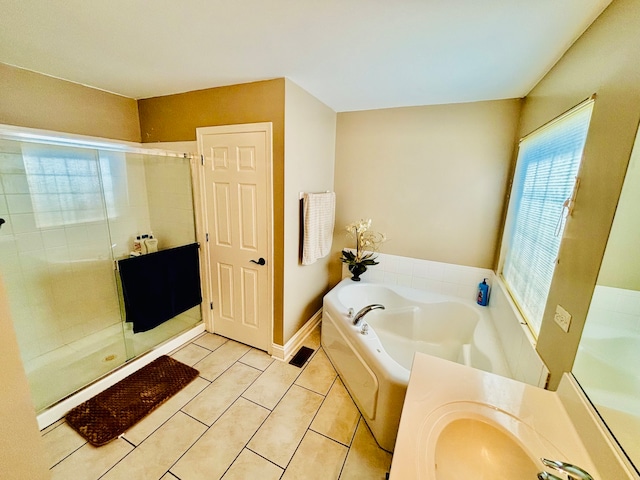 bathroom with vanity, shower with separate bathtub, and tile patterned flooring